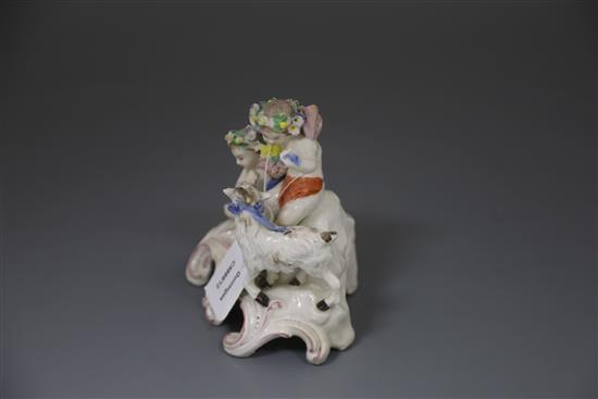 A Vauxhall porcelain group of two Bacchanalian cherubs and a goat, c.1760-5, H. 14.5cm